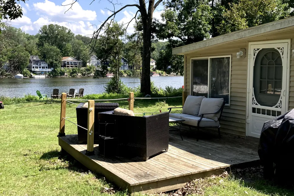 Patio and river view at Cabin 7